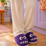 Grumbo Monster Slipper worn at home