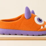 Nomlet Horned Clog, side view showing the sole